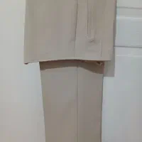 شلوارپارچه ای نیم بگ زنانه کرم رنگ وسورمه ای