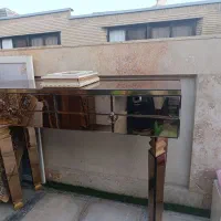 آینه و کنسول و ساعت
