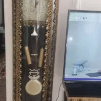 ویترین وساعت ایستاده هردو برنجی