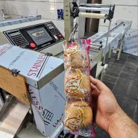 دستگاه بسته بندی انواع کیک و کلوچه و نان فانتزی