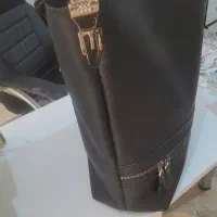 کوله دلسی اصلی و کیف چرم مشکی اصل