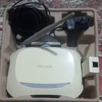 یک عدد  مودم  .TP.LINK.