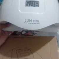 دستگاه کاشت ناخن