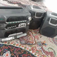 یک دستگاه سی دی به همراه ضبط قیمت توافقی