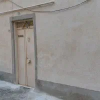 ساختمان دو طبقه دربستی