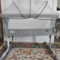 گهواره تخت کنار مادر