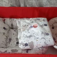 گهواره باتشک،بالشتک،لحاف،وآغوشی
