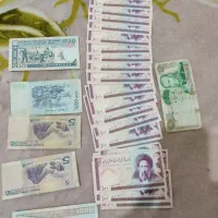 28 عدد ۱۰۰ ریالی نزدیک ۲۰ عدد سریالی