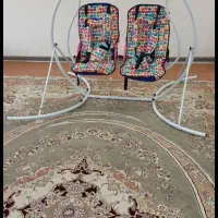 تاب بازی کودک دو قلو
