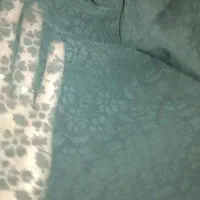 چادرمجلسی ندوخته و یک قواره چادر دوخته شده