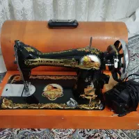 چرخ خیاطی شیر خوابیده