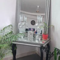 آینه و شمعدان و ساعت