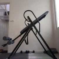 تخت وارونه(اینورژن) جهت بهبود دیسک کمر
