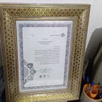 تعدادی قاب عکس وقاب خالی  چوبی وخاتم کاری