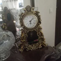 ساعت طرح برنز و کشکول