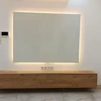 کار کابینت کمددیواری جاکفشی تیکه کاری انجام‌میشود